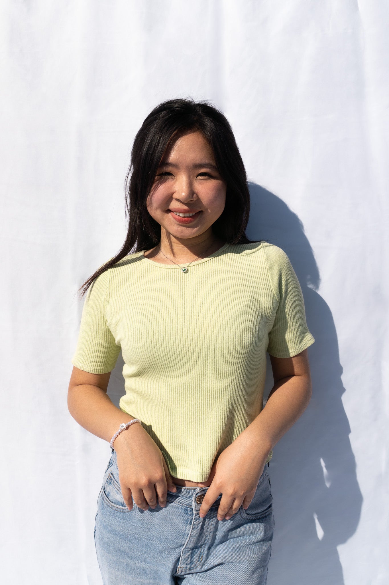 Detailed View of Lacausa Green Sweater Rib Short Sleeve Top Neckline