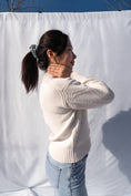 Load image into Gallery viewer, Sustainable Secondhand Off-White Sweater - side view
