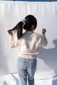Load image into Gallery viewer, Sustainable Secondhand Off-White Sweater - back view
