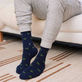Load image into Gallery viewer, Model wearing Navy Turtles Socks that protect turtles, displayed on Its Trendi
