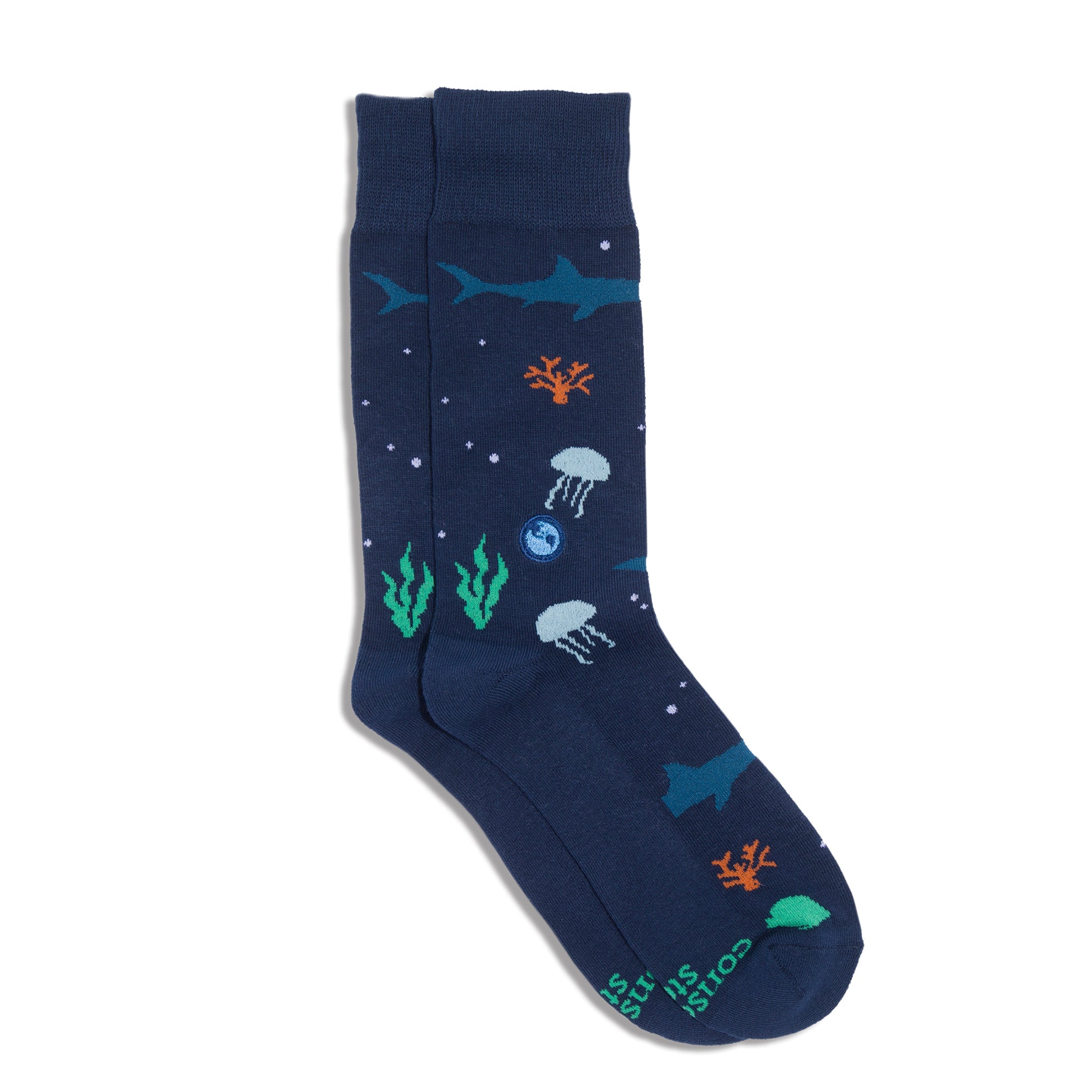Close-up of Navy Ocean Socks featuring jellyfish, and ocean life
